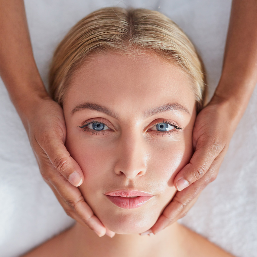 Woman getting a facial - botox near me