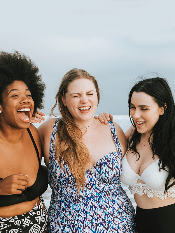 Happy women at the beach - weight loss injections at Inspire Health Clinics in South Jordan, UT
